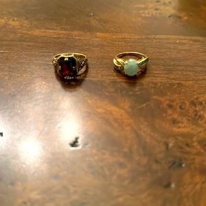 Two 10k rings. One with red stone and one with opal.